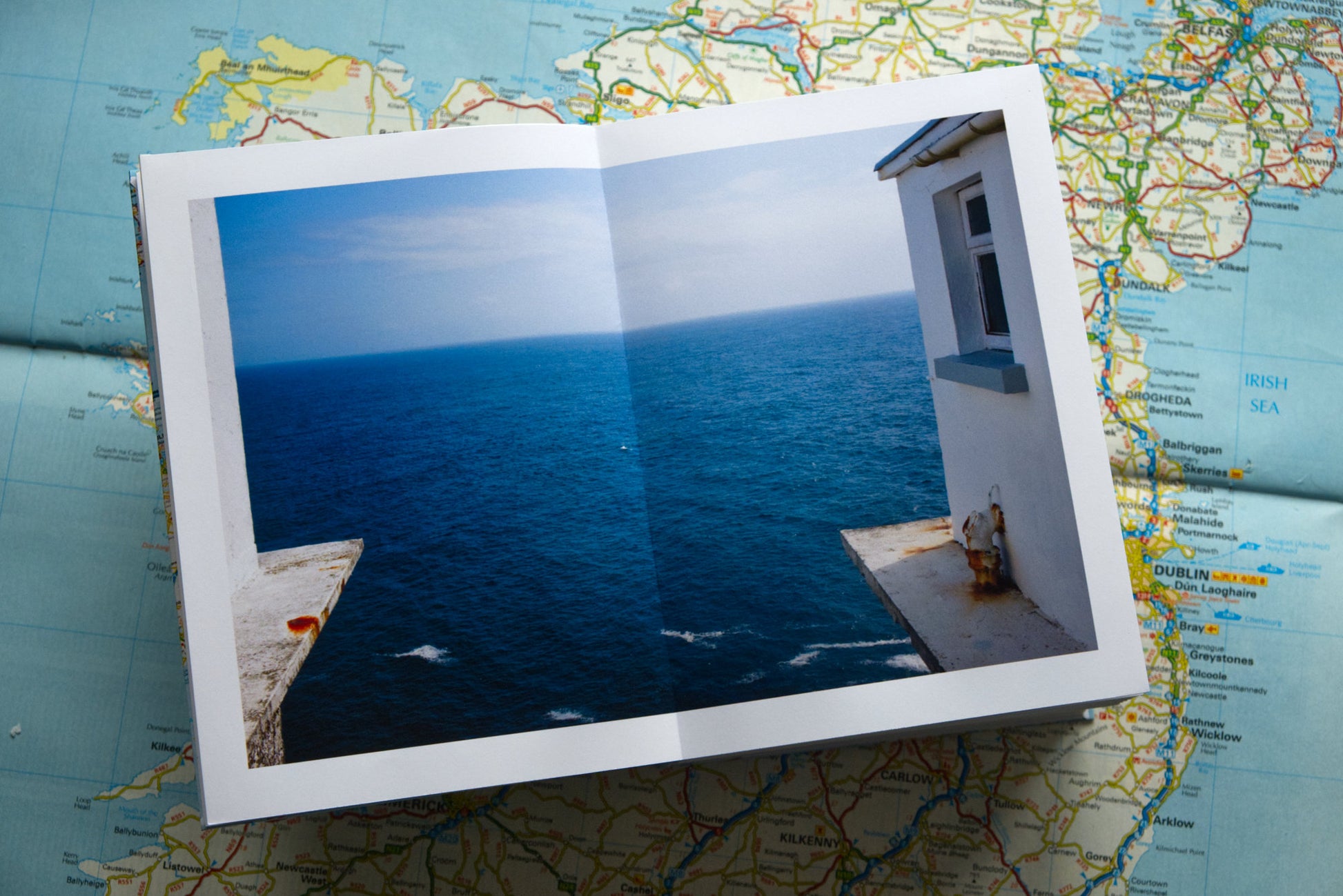 product photo showing double page spread of photograph at Mizen Head in Ireland from handmade photography book by Paul Treacy